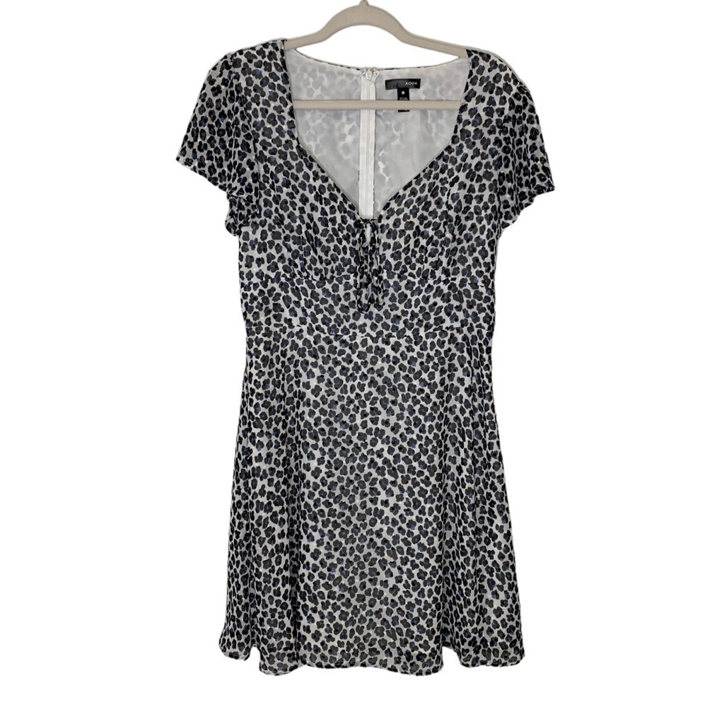 Aqua Leopard Mini Babydoll Dress Swiss dot ruffle. EUC Size L